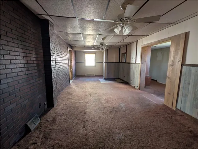 a view of empty room with windows