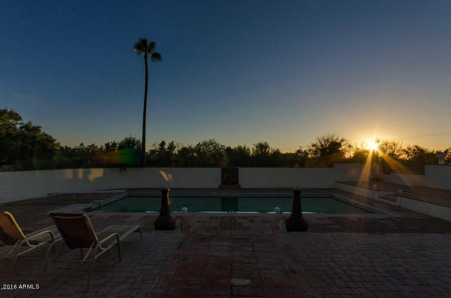 5111 North Camelhead Road Phoenix, AZ 85018 - Photo 30 of 34 Pool view at sunset