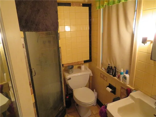 a bathroom with a sink and toilet