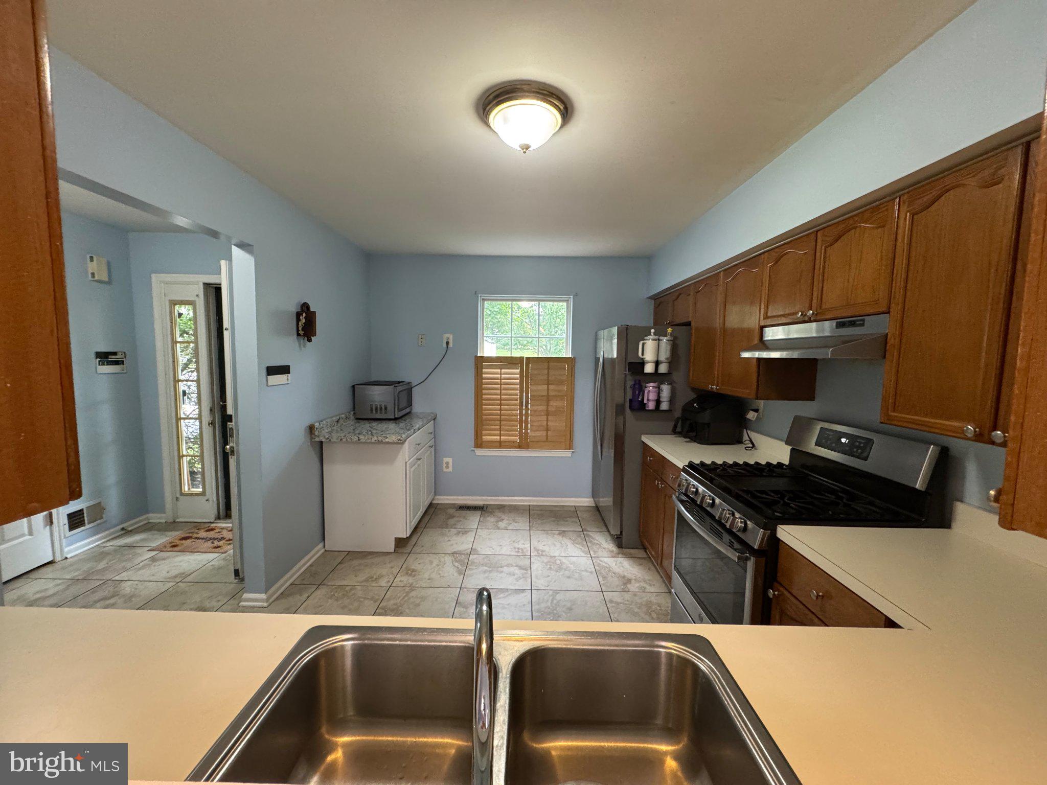 5000 Esther Reed Drive Doylestown, PA 18902 - Photo 5 of 14 Bright and inviting kitchen space.