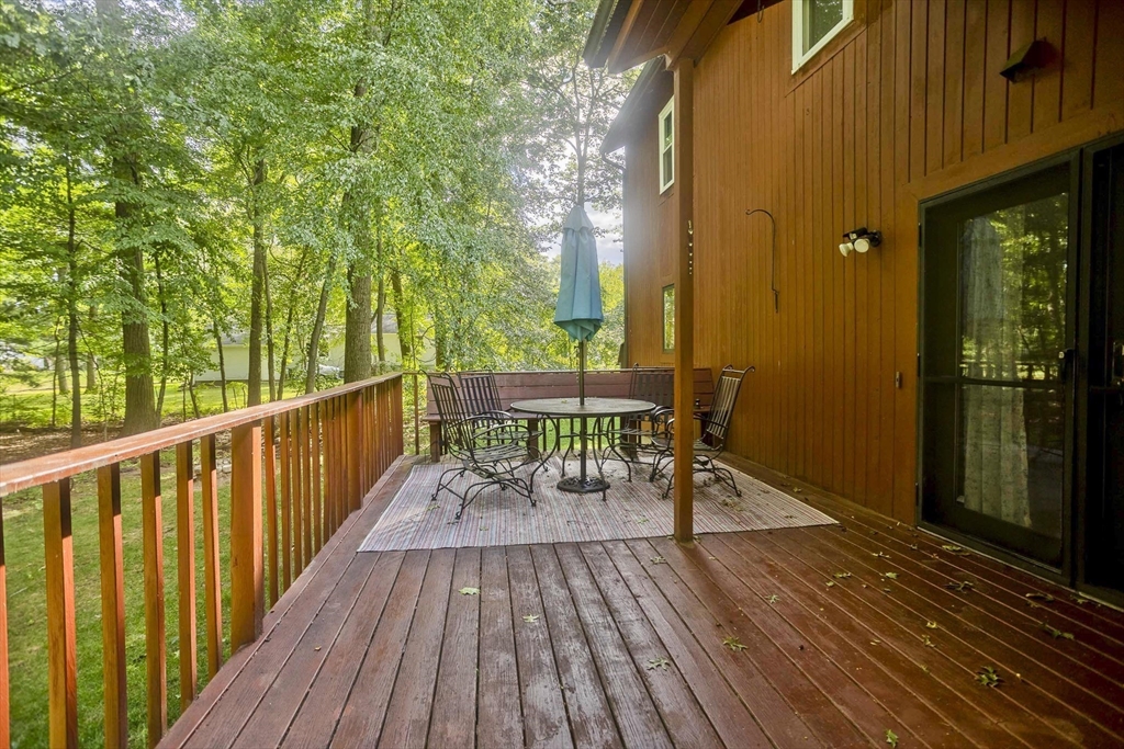 27 Bunker Circle East Longmeadow, MA 01028 - Photo 31 of 36 a view of balcony with wooden floor and outdoor seating