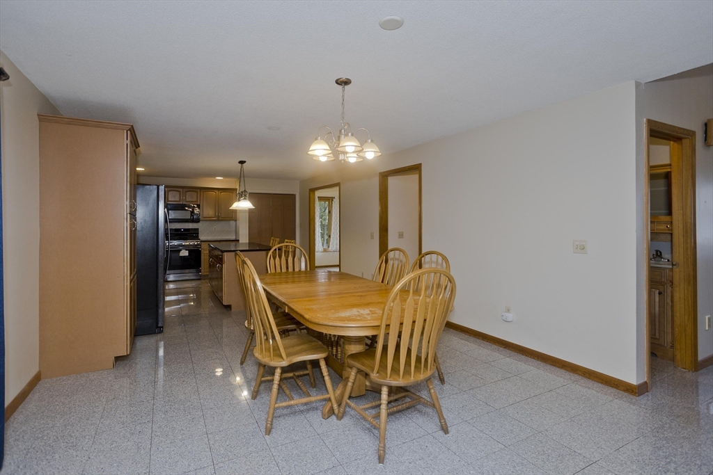 27 Bunker Circle East Longmeadow, MA 01028 - Photo 6 of 36 a dining room with furniture and window