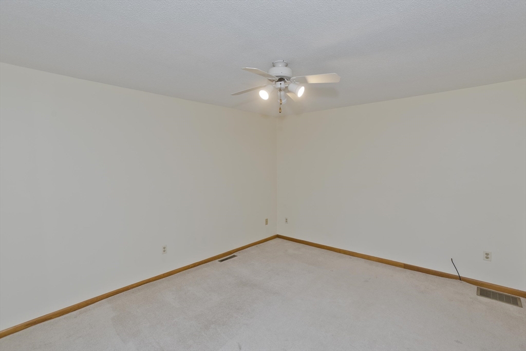 27 Bunker Circle East Longmeadow, MA 01028 - Photo 10 of 36 a view of an empty room