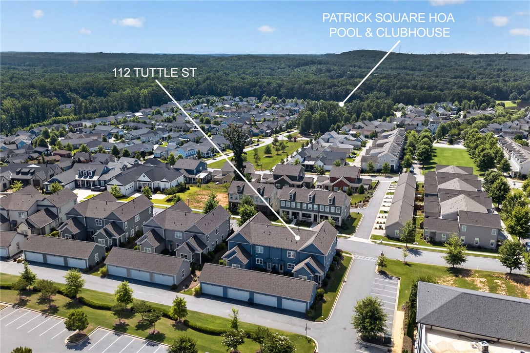 112 Tuttle Street Clemson, SC 29631 - Photo 40 of 46 An aerial perspective reveals a vibrant neighborhood nestled among lush, green expanses and tree-lined streets.