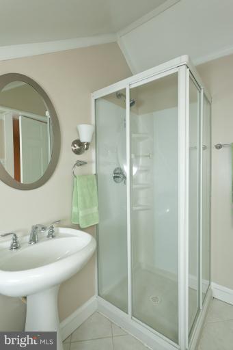 5430 Springlake Way Baltimore, MD 21212 - Photo 4 of 30 a bathroom with a sink toilet and shower