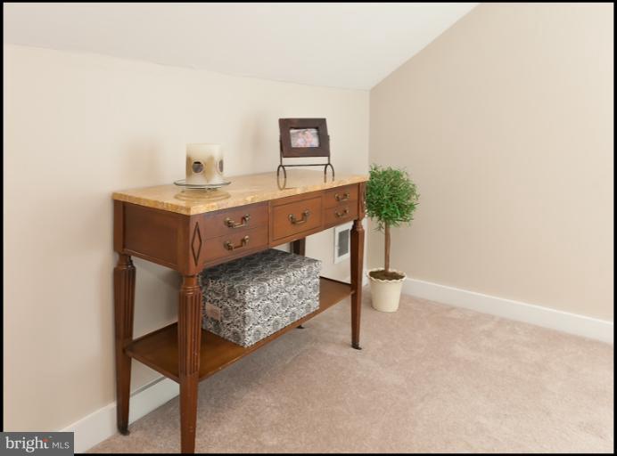 5430 Springlake Way Baltimore, MD 21212 - Photo 5 of 30 a room with painting and a table
