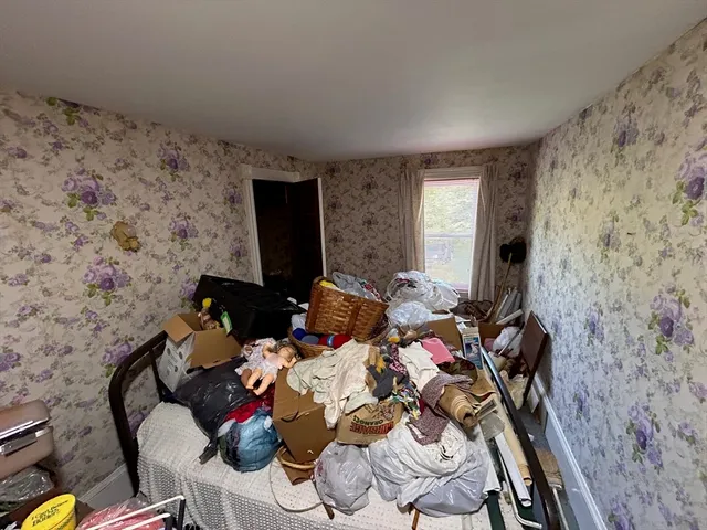 a view of a balcony with wooden floor