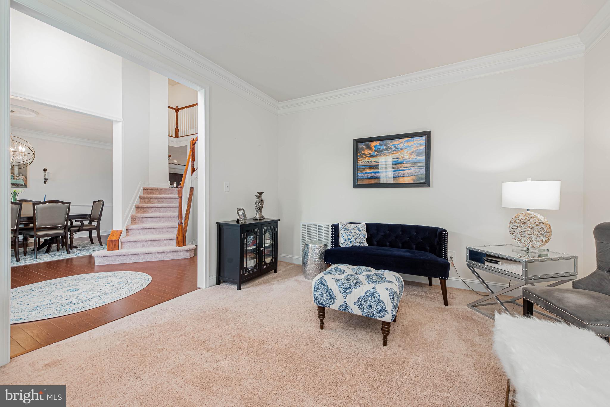 36932 Grove Estate Road Lewes, DE 19958 - Photo 30 of 105 a living room with furniture and wooden floor