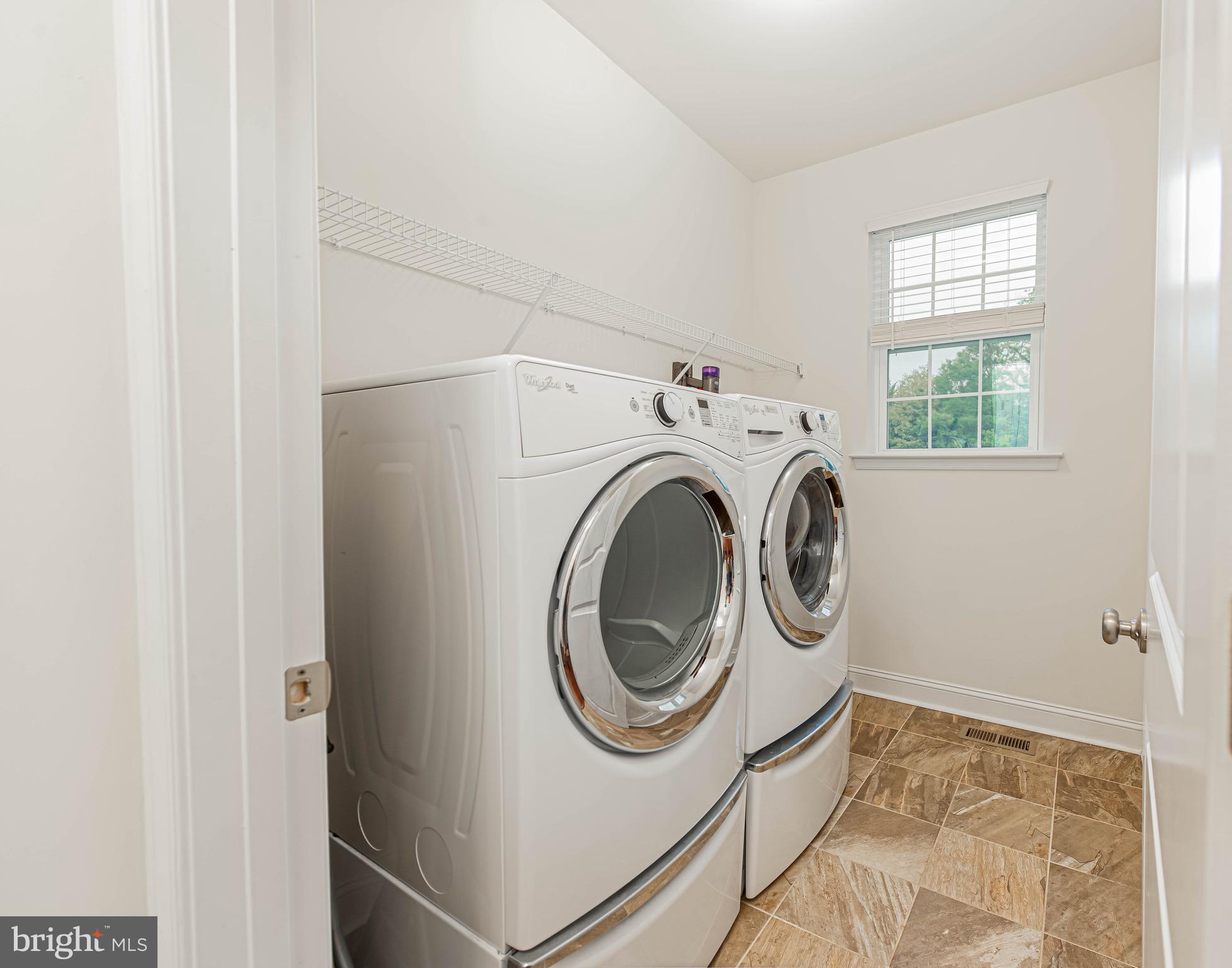 36932 Grove Estate Road Lewes, DE 19958 - Photo 44 of 105 a utility room with dryer and washer