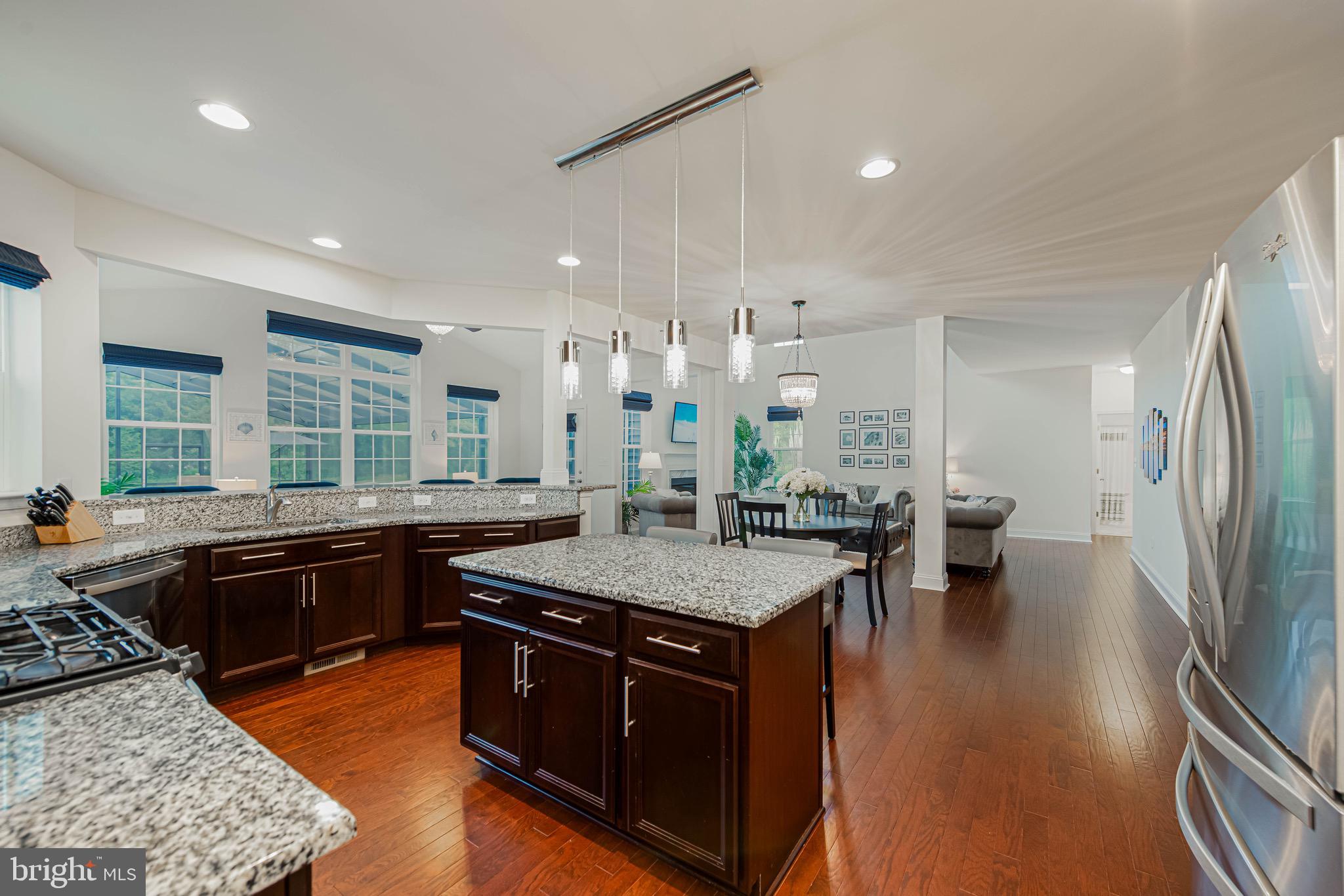 36932 Grove Estate Road Lewes, DE 19958 - Photo 45 of 105 a kitchen with a stove and a refrigerator