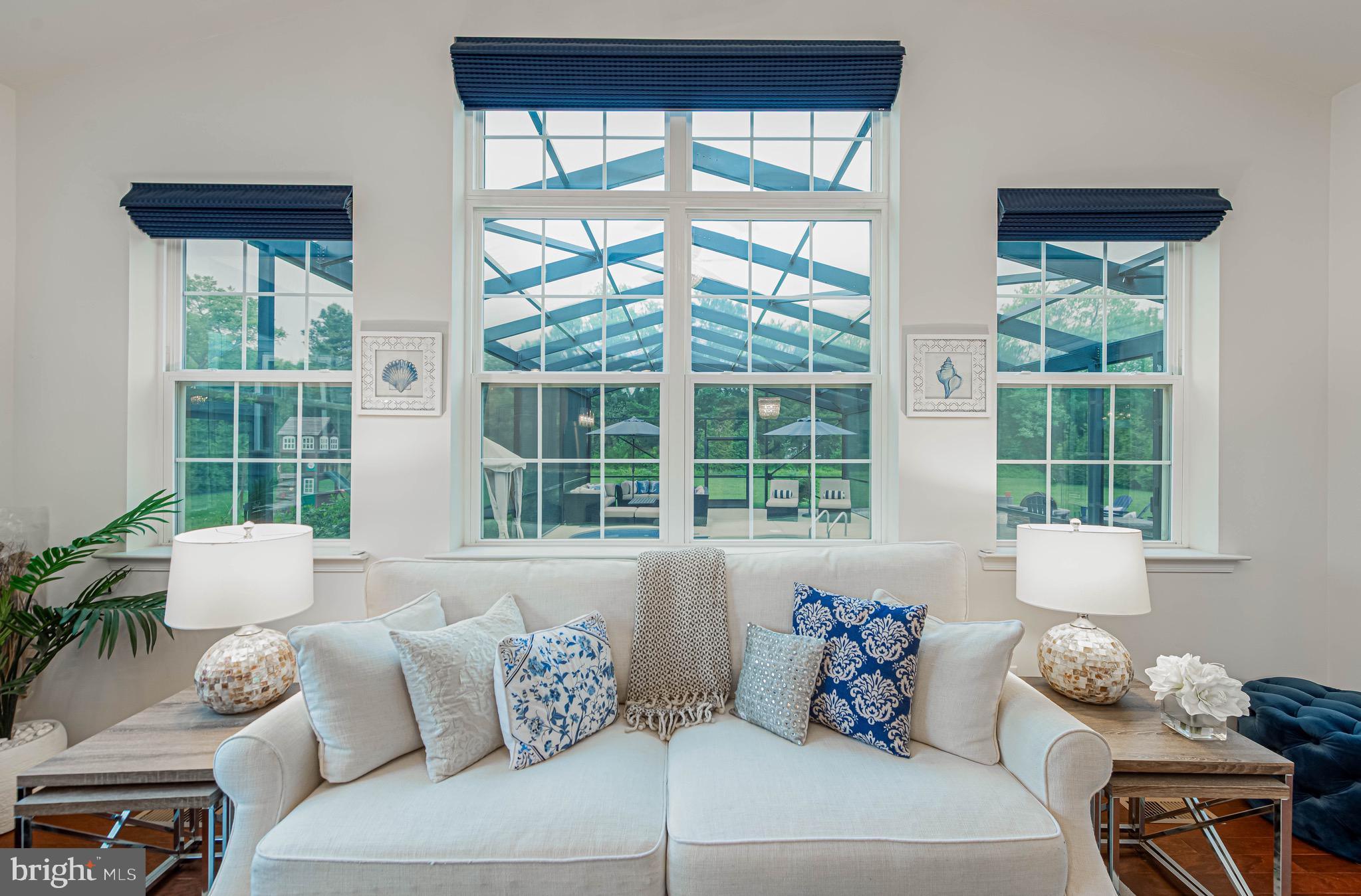 36932 Grove Estate Road Lewes, DE 19958 - Photo 49 of 105 a living room with furniture and a large window