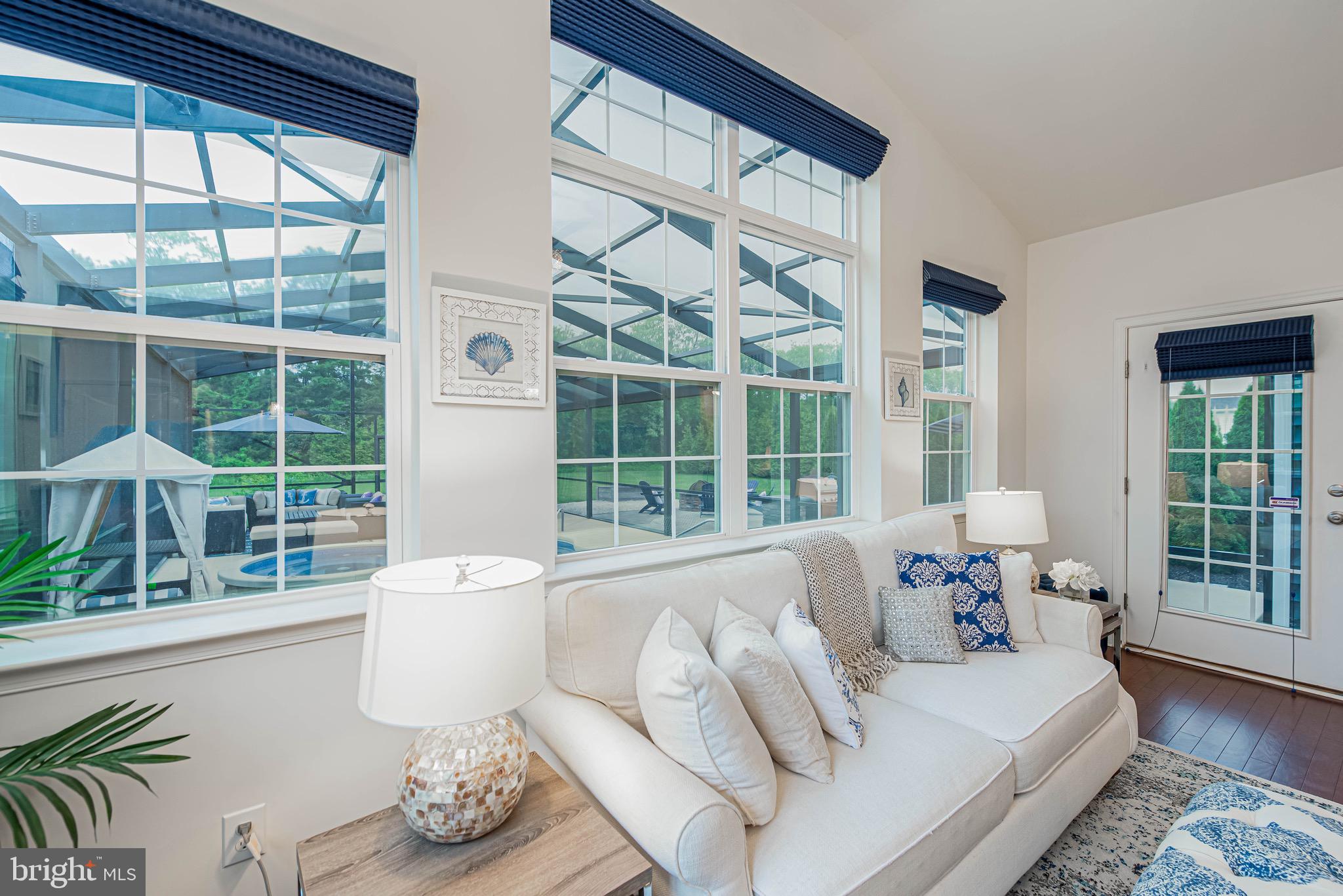 36932 Grove Estate Road Lewes, DE 19958 - Photo 50 of 105 a bedroom with furniture and a large window