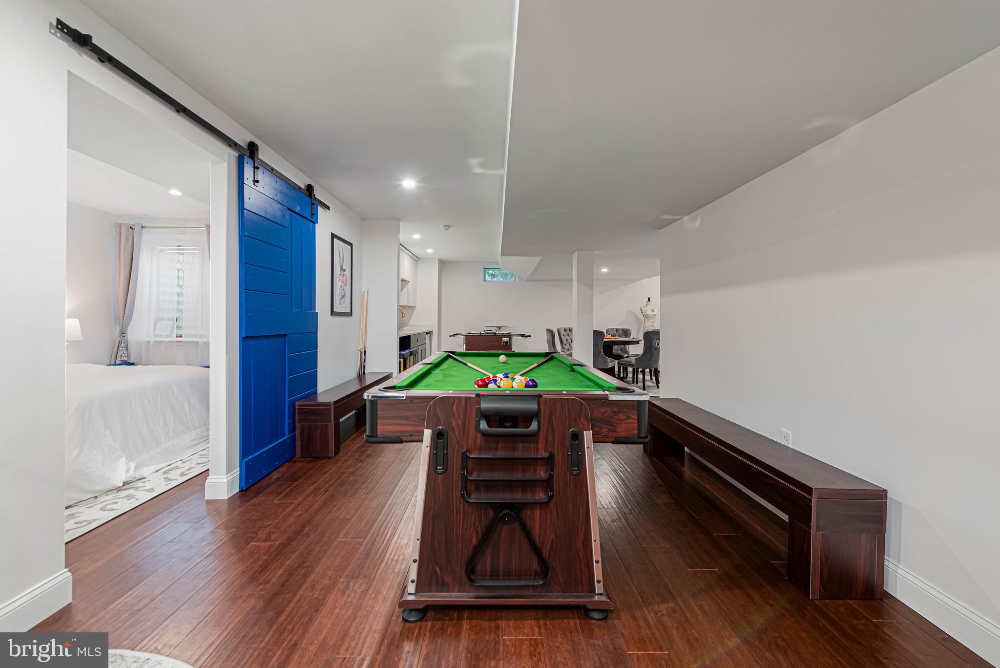 36932 Grove Estate Road Lewes, DE 19958 - Photo 83 of 105 a room with furniture and wooden floor