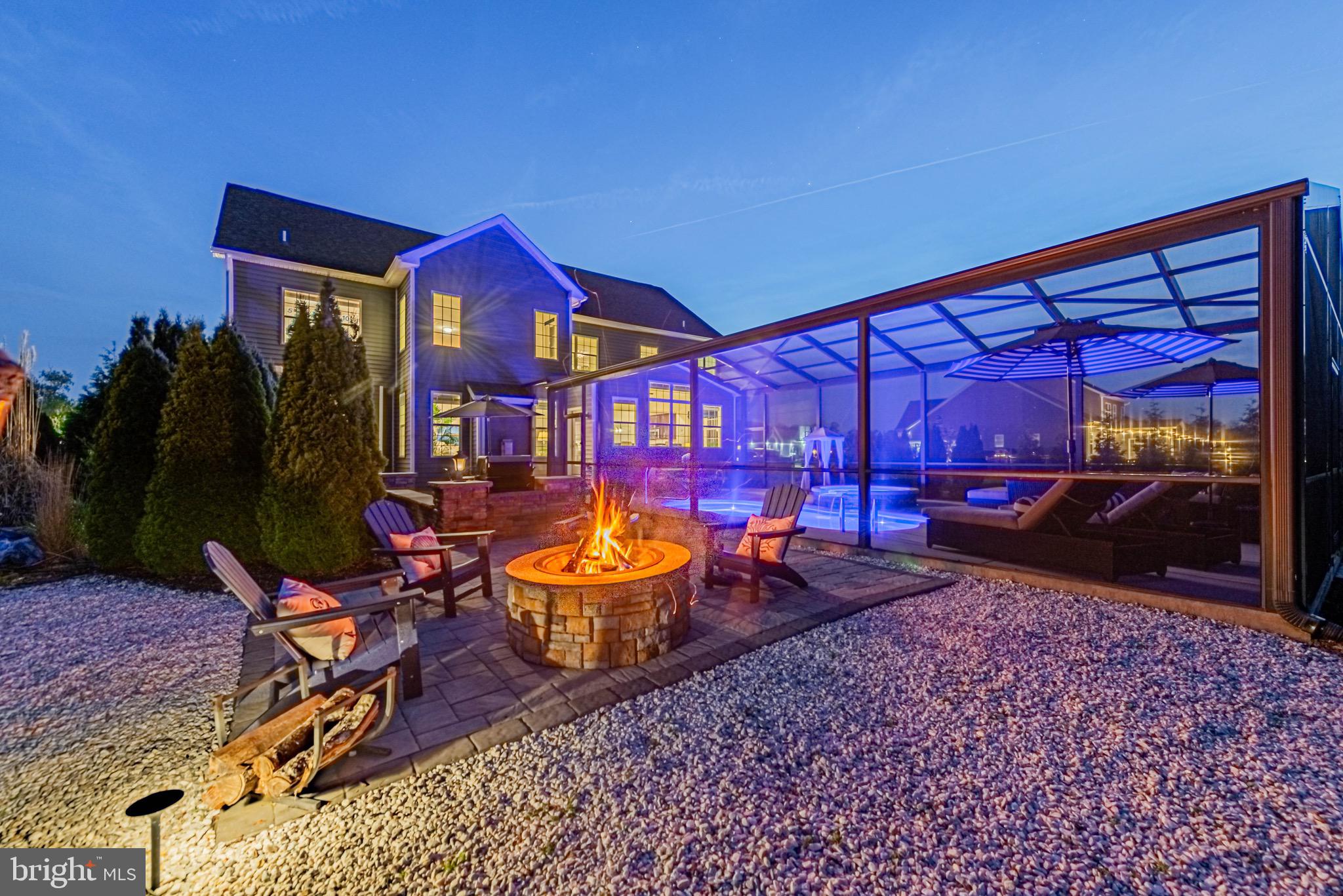 36932 Grove Estate Road Lewes, DE 19958 - Photo 95 of 105 swimming pool view with a seating space and garden