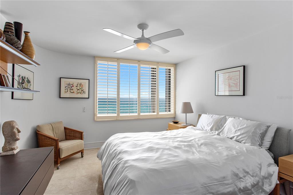775 Longboat Club Road, Unit 808 Longboat Key, FL 34228 - Photo 25 of 41 a bedroom with a bed and a couch