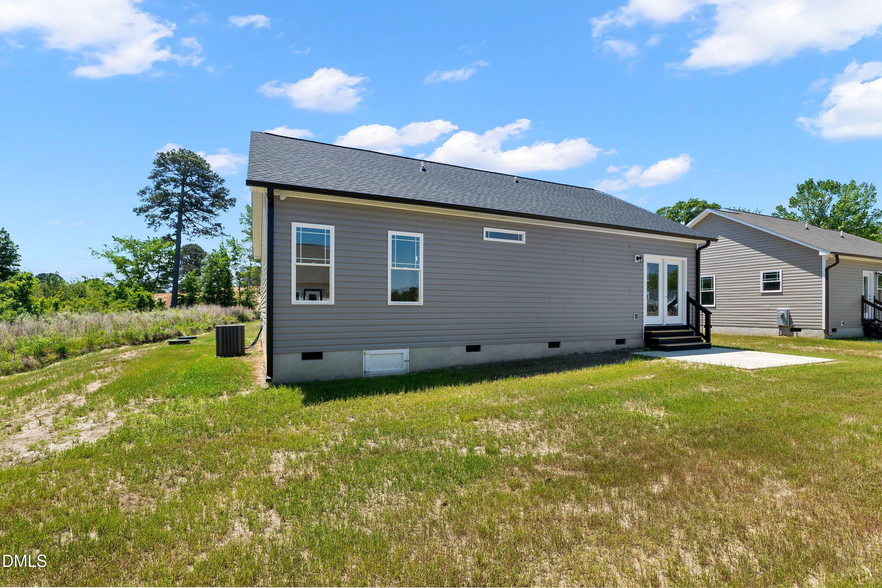 926 Micro Road West Selma, NC 27576 - Photo 41 of 41 a house view with a garden space