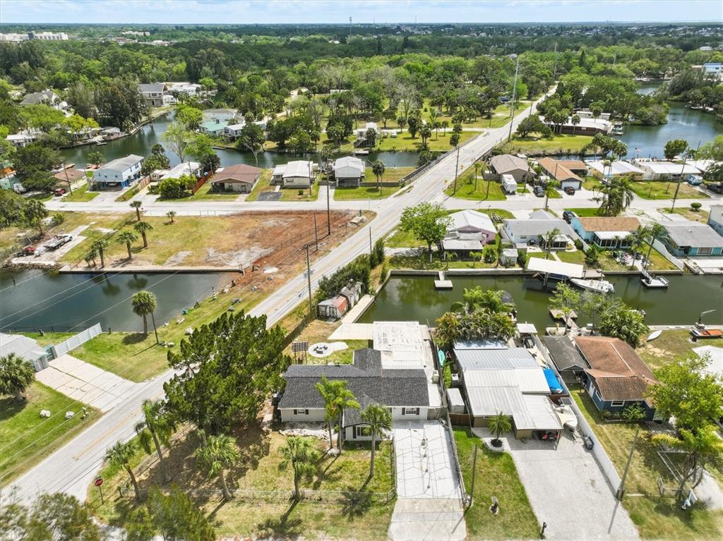 7114 Fair Lane Hudson, FL 34667 - Photo 11 of 59 an aerial view of residential houses with outdoor space