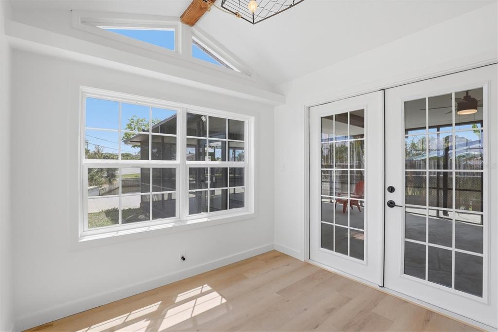 7114 Fair Lane Hudson, FL 34667 - Photo 25 of 59 a view of empty room with windows