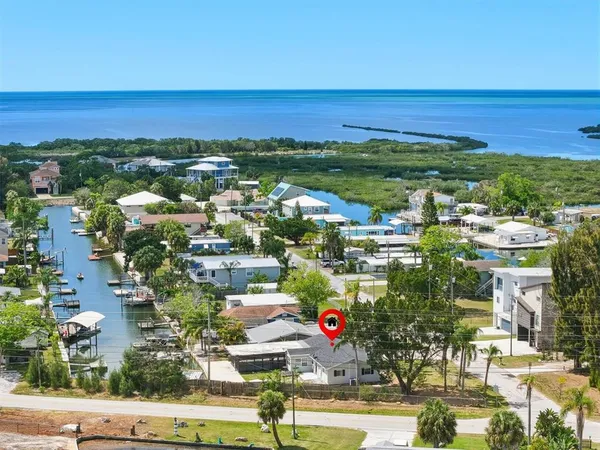 a view of a city with an ocean