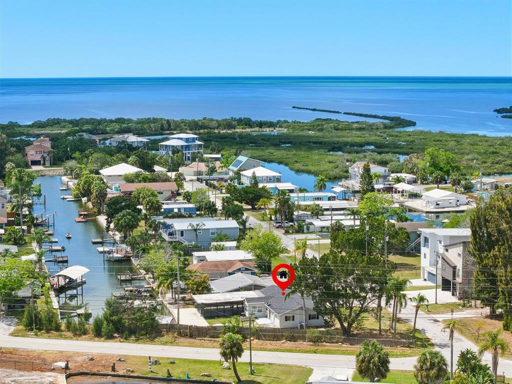 7114 Fair Lane Hudson, FL 34667 - Photo 3 of 59 a view of a city with an ocean