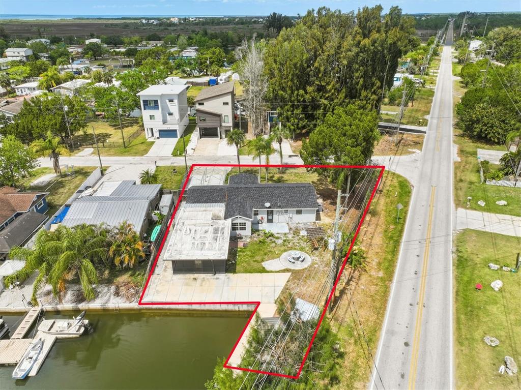 7114 Fair Lane Hudson, FL 34667 - Photo 56 of 59 a view of a swimming pool with a yard