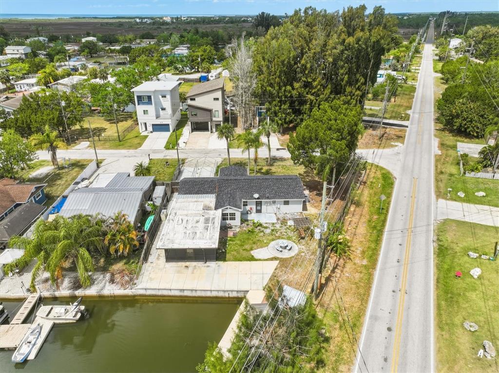 7114 Fair Lane Hudson, FL 34667 - Photo 57 of 59 an aerial view of residential houses with outdoor space