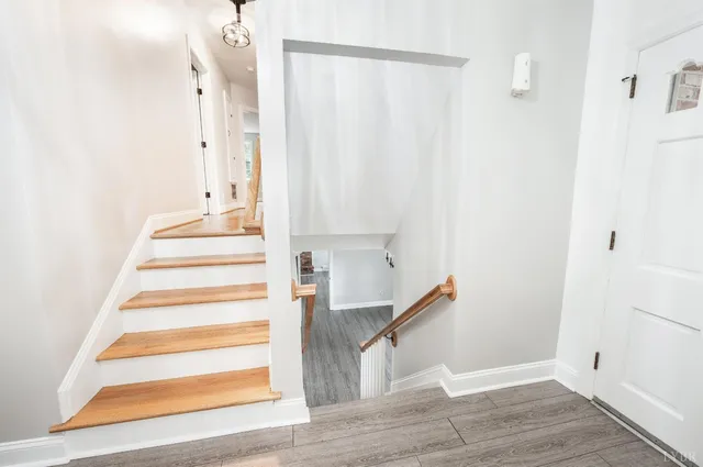 a view of an entryway with staircase