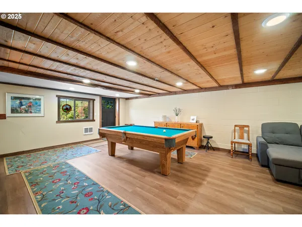 a room with furniture and a wooden floor