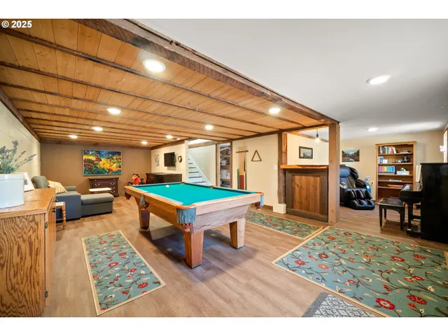 a room with furniture and a wooden floor