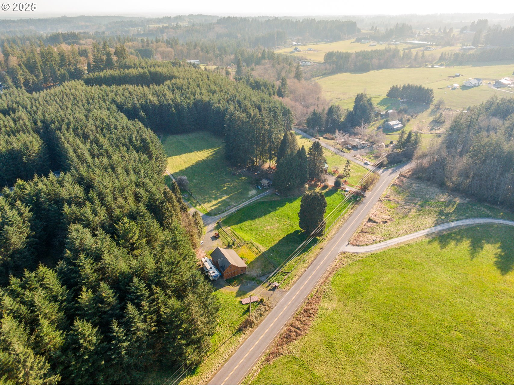 13505 Northeast Grantham Road La Center, WA 98629 - Photo 29 of 29 an aerial view of a house with a lake view