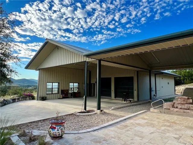a front view of a house with a garage