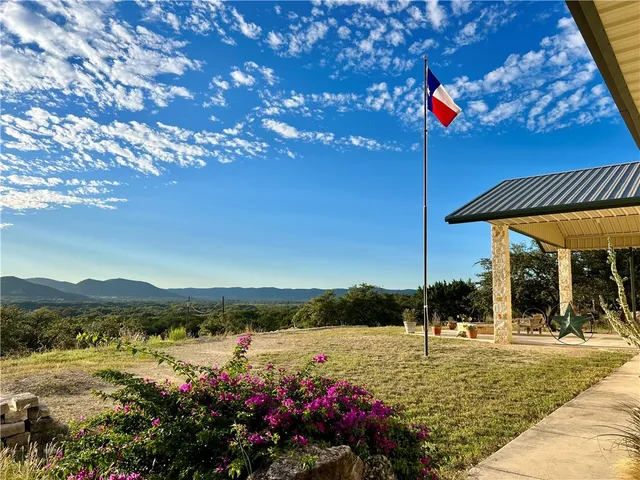 a view of an ocean with a mountain view