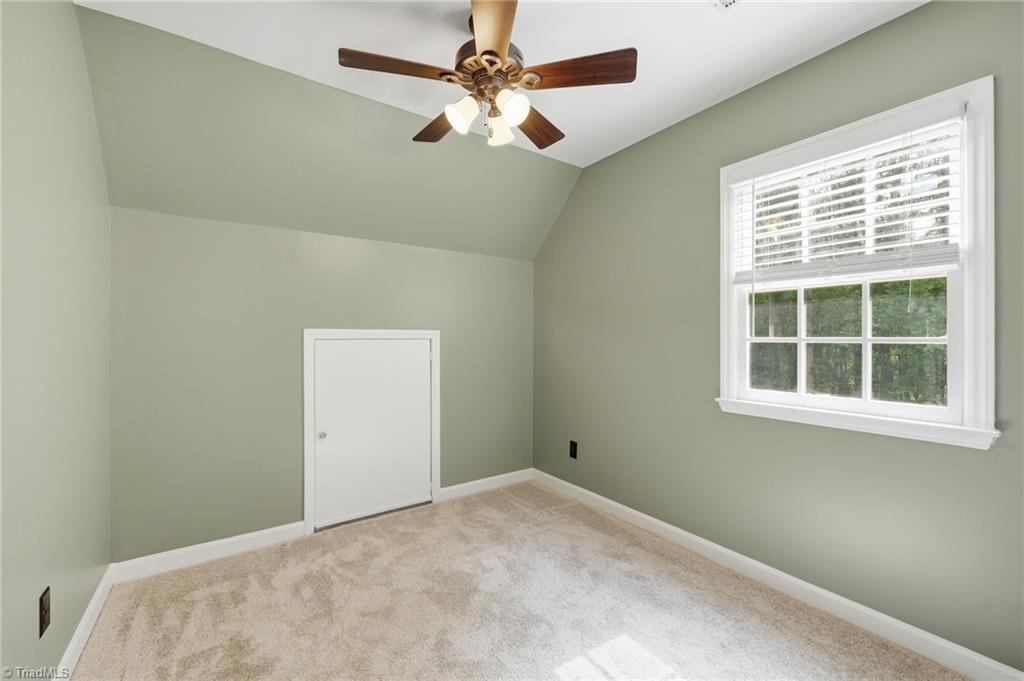 8861 Boylston Road Colfax, NC 27235 - Photo 32 of 50 A versatile flex room is ideal as a home office, nursery, craft room, or quiet reading retreat.