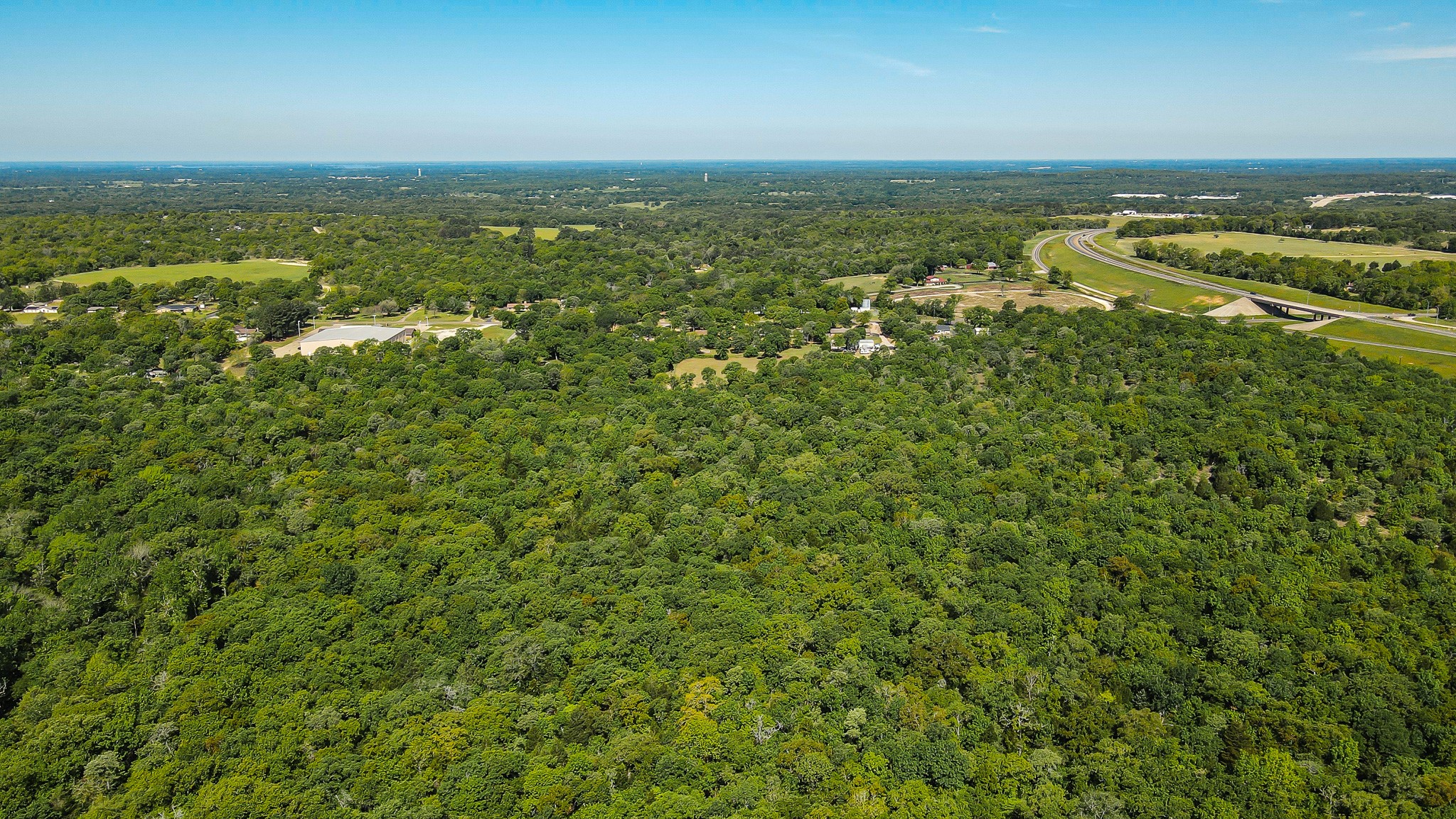 1 Fm 2494 Athens, TX 75751 - Photo 11 of 16 an aerial view of residential houses with outdoor space and trees