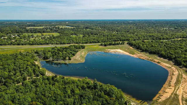 a view of a lake from a balcony