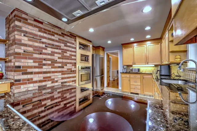 a view of a living room with furniture