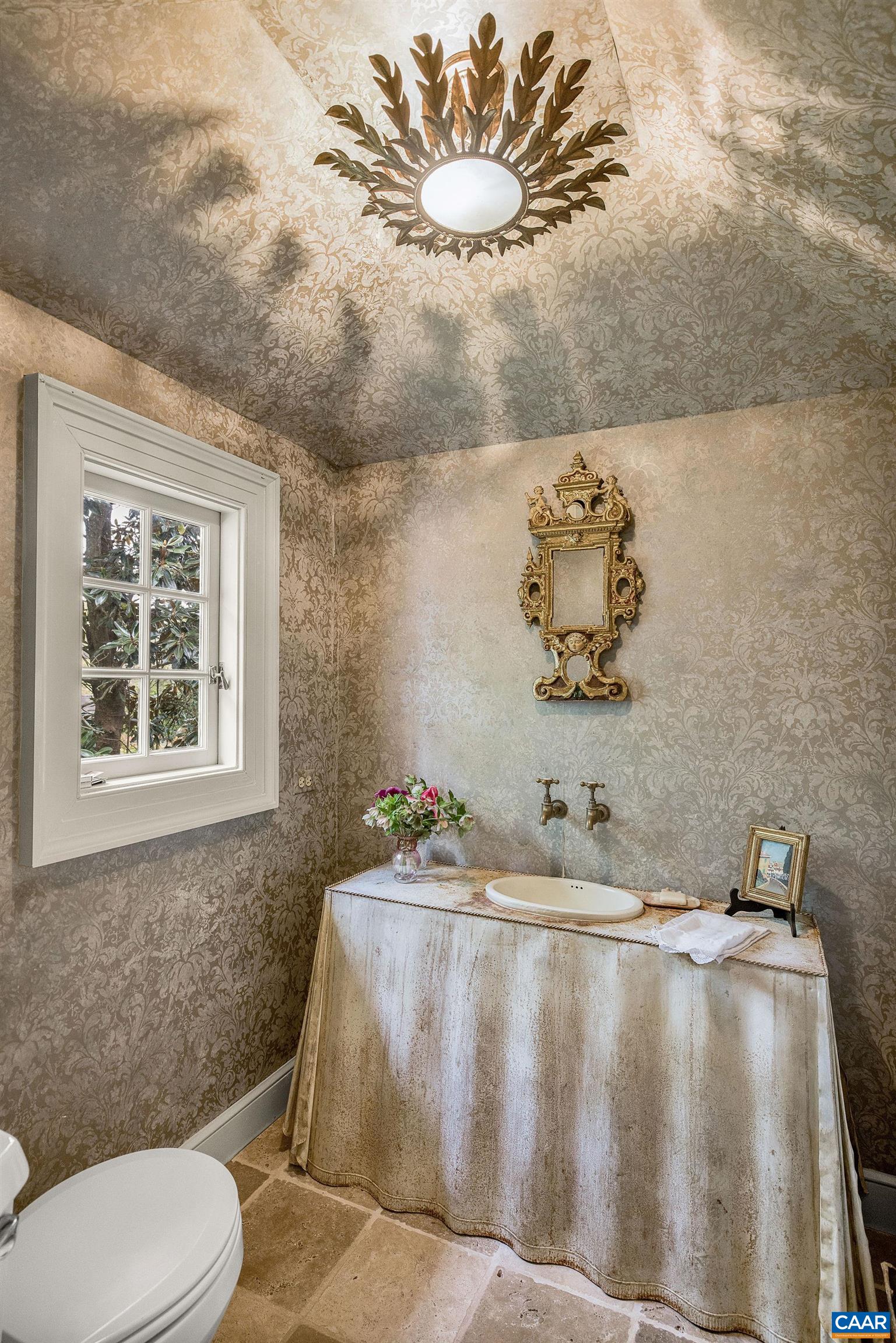 1985 Stony Point Road Charlottesville, VA 22911 - Photo 11 of 62 a bathroom with a granite countertop sink a toilet and a mirror