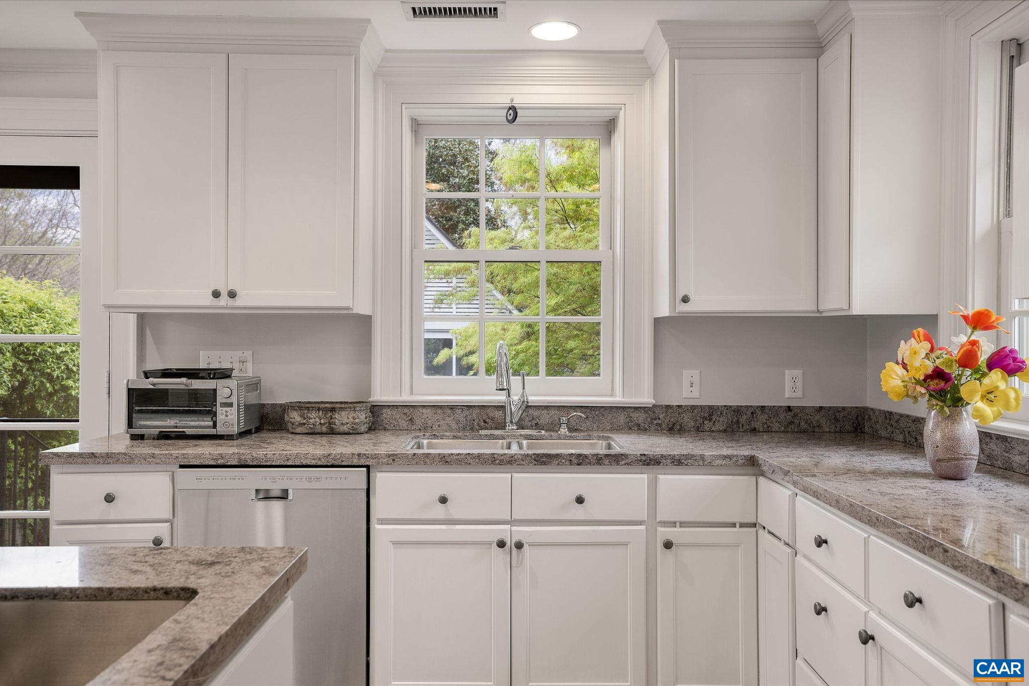 1985 Stony Point Road Charlottesville, VA 22911 - Photo 18 of 62 a kitchen with granite countertop white cabinets and a window