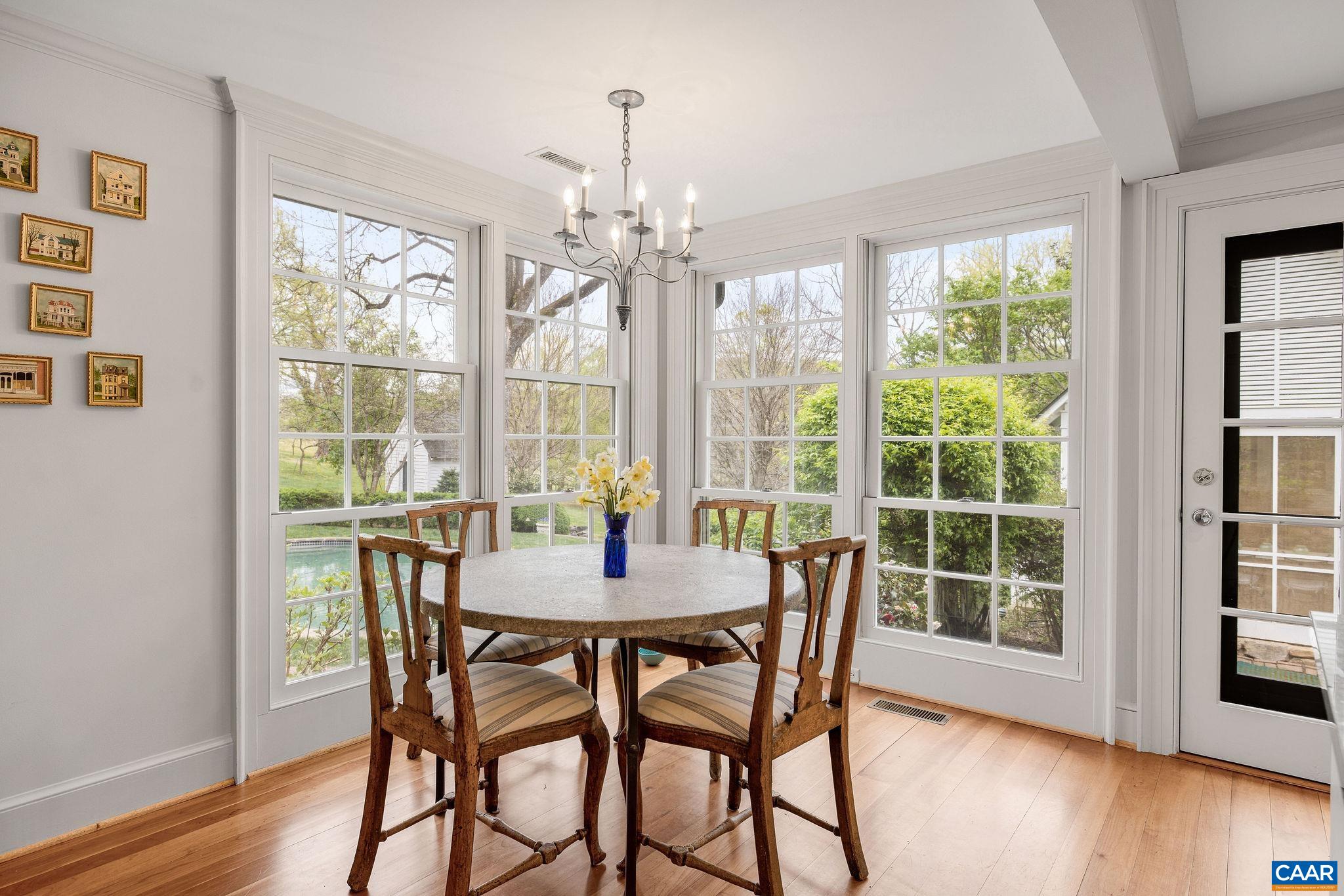 1985 Stony Point Road Charlottesville, VA 22911 - Photo 20 of 62 a view of a dining room with furniture window and wooden floor