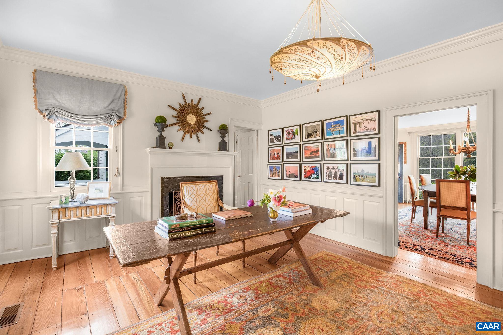 1985 Stony Point Road Charlottesville, VA 22911 - Photo 27 of 62 a living room with furniture a table and a fireplace