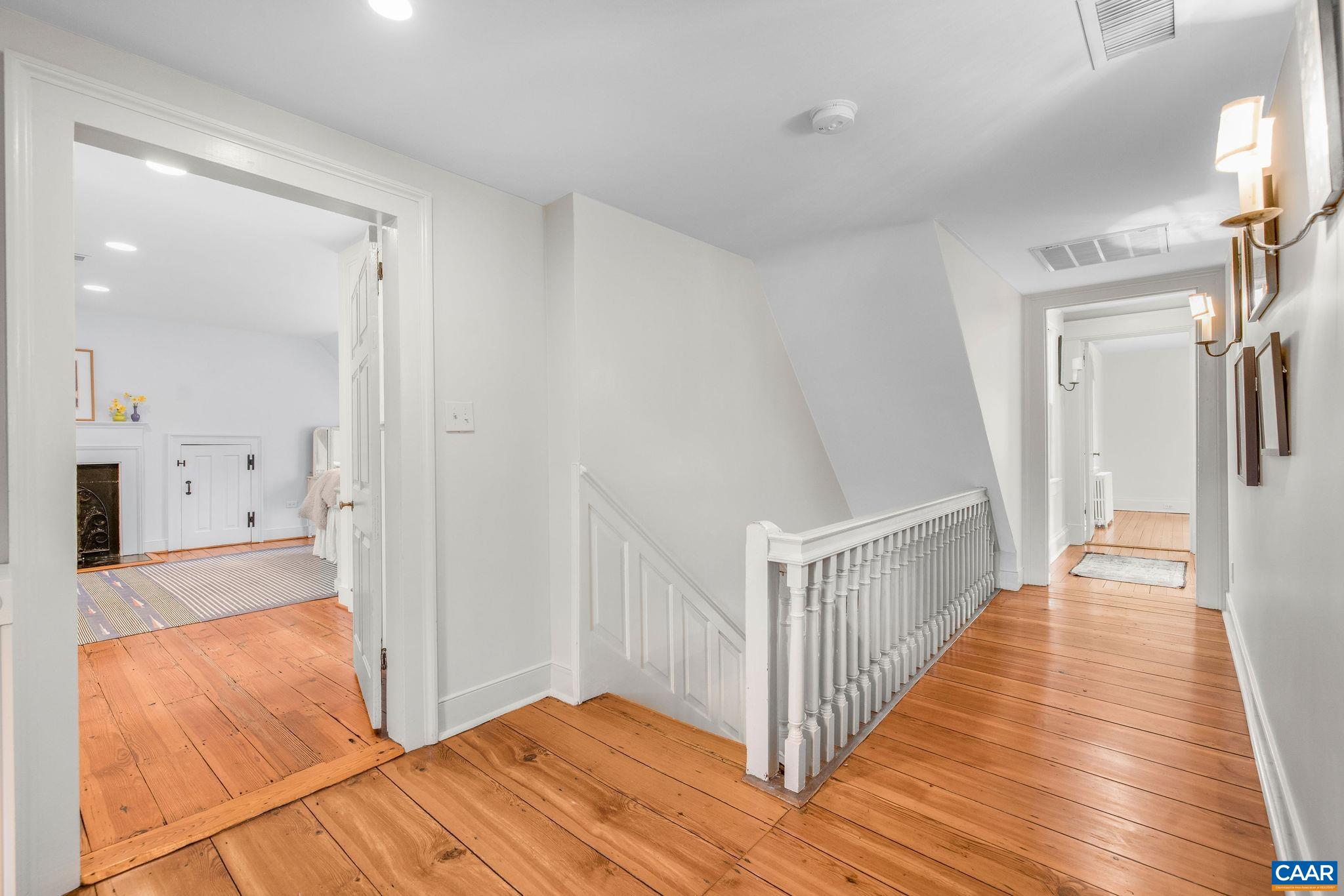 1985 Stony Point Road Charlottesville, VA 22911 - Photo 31 of 62 a view of a hallway with wooden floor and staircase