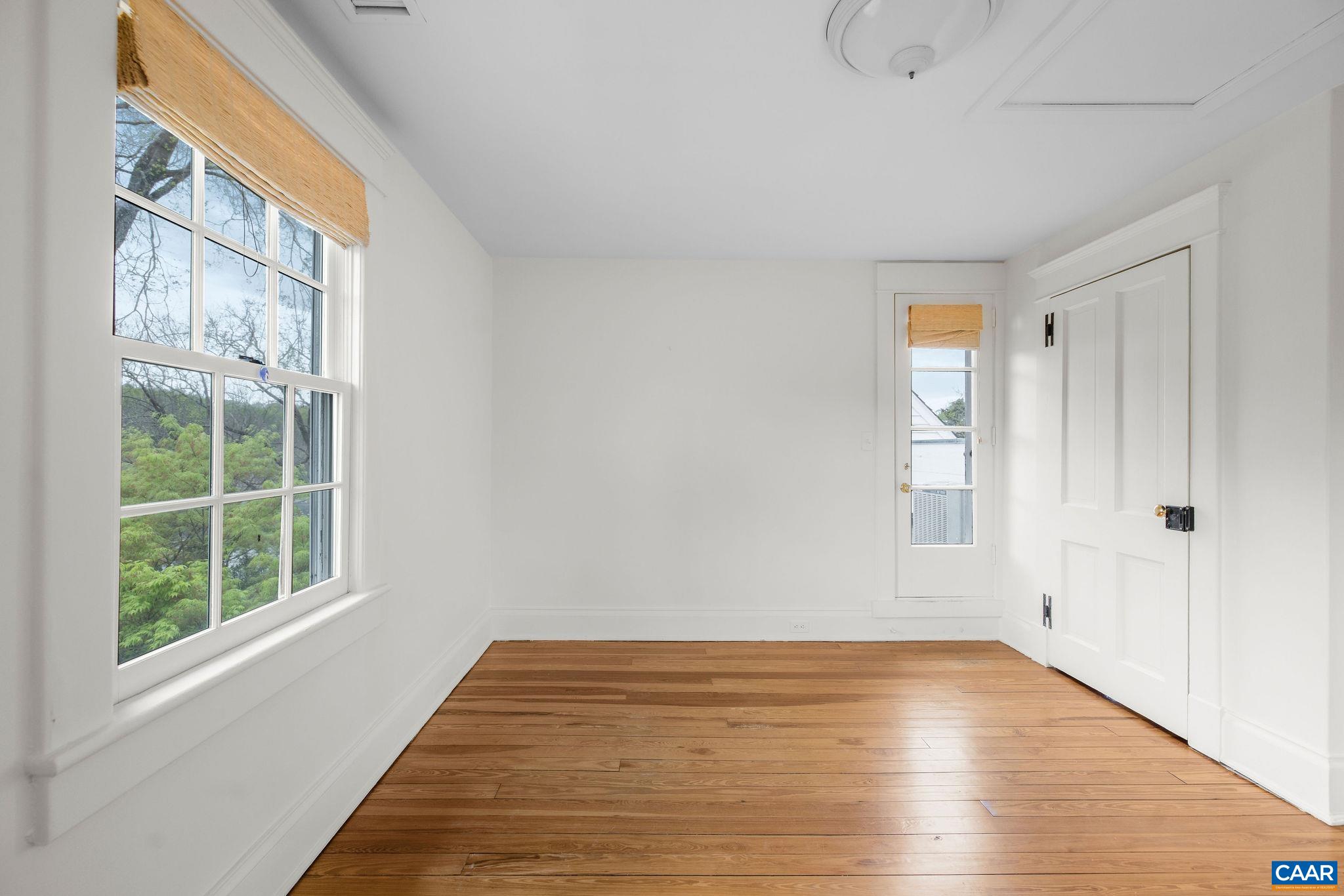 1985 Stony Point Road Charlottesville, VA 22911 - Photo 39 of 62 a view of empty room with wooden floor and fan