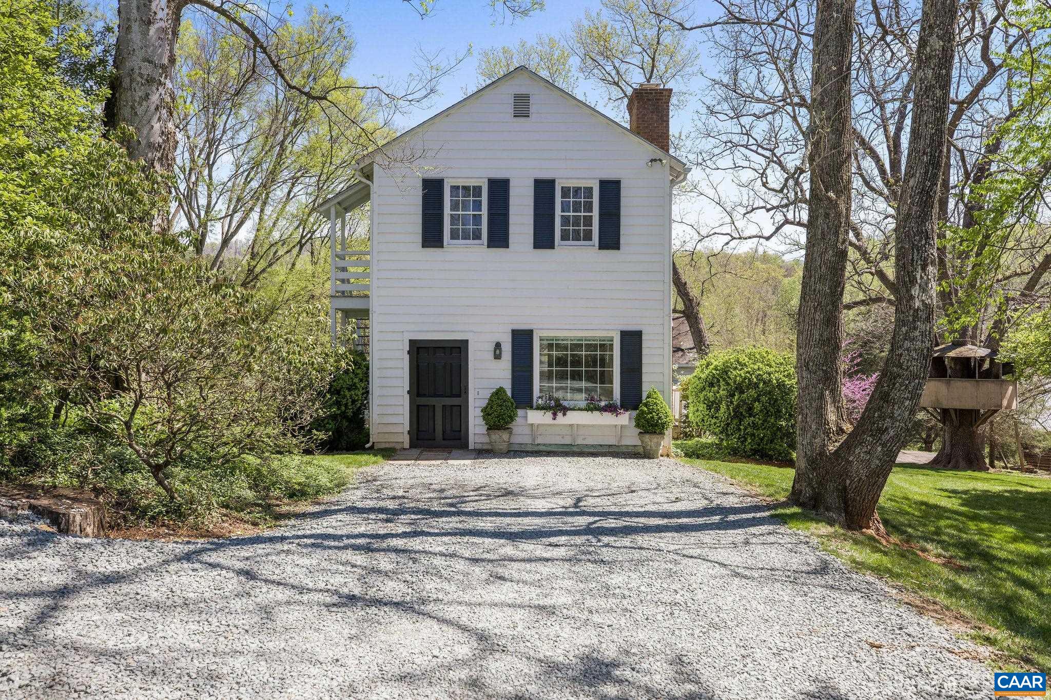 1985 Stony Point Road Charlottesville, VA 22911 - Photo 48 of 62 a front view of a house with yard and trees