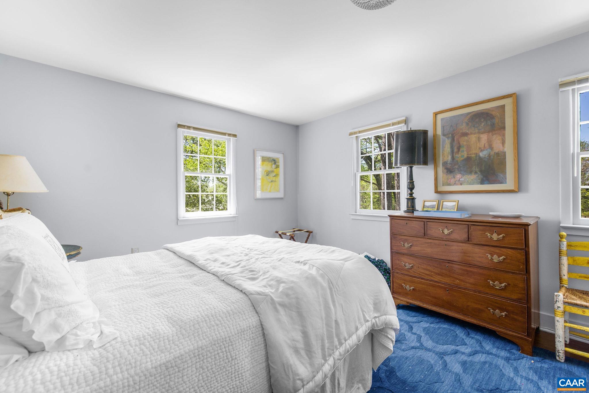 1985 Stony Point Road Charlottesville, VA 22911 - Photo 56 of 62 a bedroom with a bed and a dresser