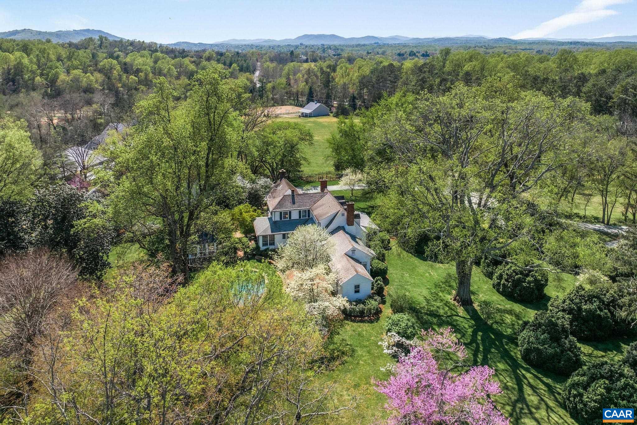 1985 Stony Point Road Charlottesville, VA 22911 - Photo 62 of 62 a view of a lush green forest with trees and some houses