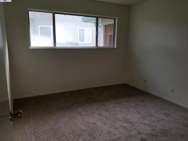 an empty room with closet