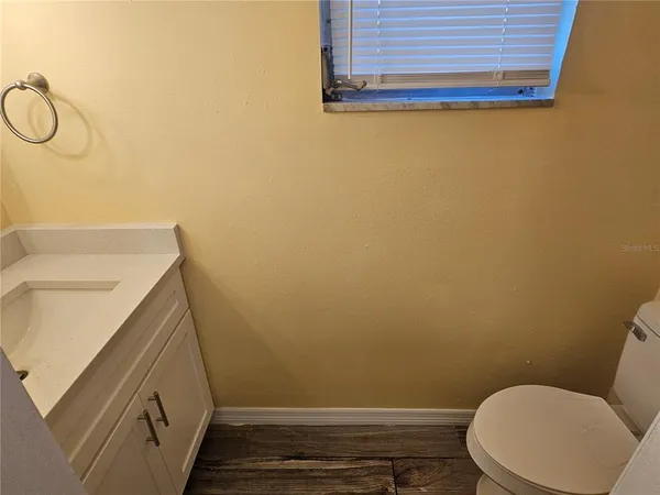 a bathroom with a sink and a toilet
