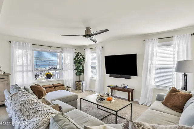 a kitchen with granite countertop a sink stove and cabinets