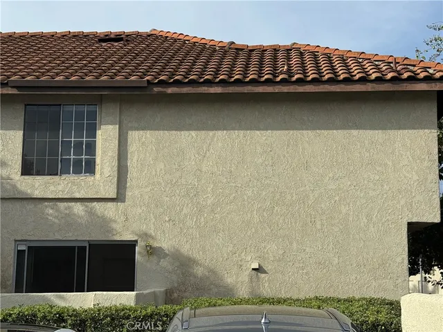 a view of front door of house with outdoor space