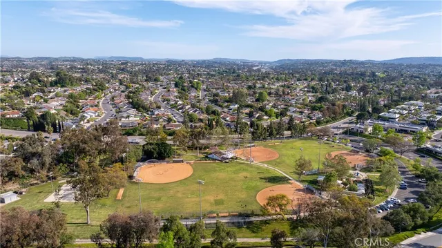 an aerial view of a house with a lake view